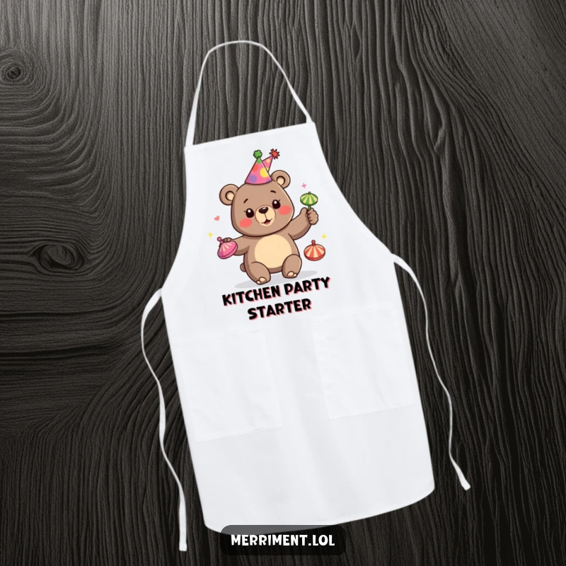 Funny apron showcasing a happy bear in a party hat, juggling colorful spinning tops, perfect for festive kitchen fun.