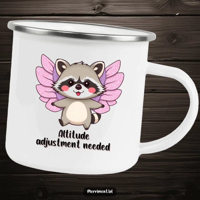 Funny enamel camping mug with a blushing raccoon wearing glittery paper wings, attempting to fly outdoors.