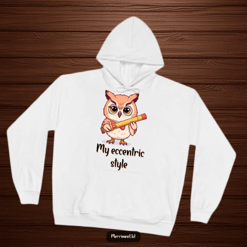 Funny hoodie design of a determined owl in a silly bowtie playing a kazoo, offering cozy comfort with a musical twist.