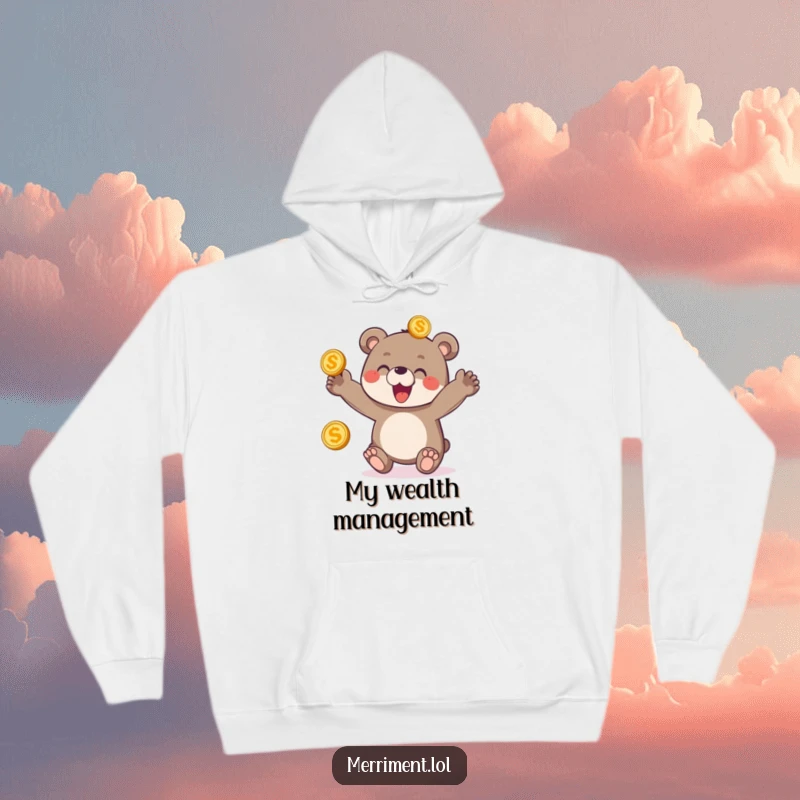 Funny hoodie featuring a delighted bear cub enthusiastically juggling three shiny golden coins, radiating pure, playful joy.