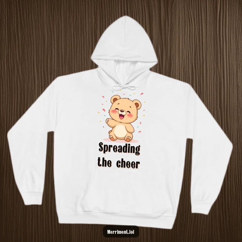 Funny hoodie featuring a giggling bear cub gleefully tossing confetti, perfect for cozy and cheerful days.