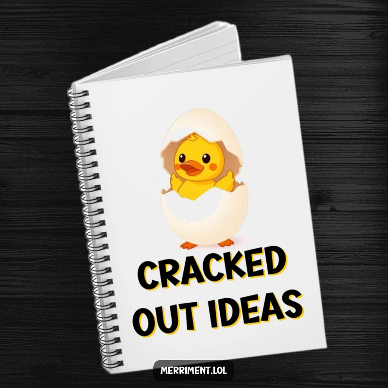 Funny surprised egg notebook hatching a tiny rubber duck, a quirky and humorous journal for writing.