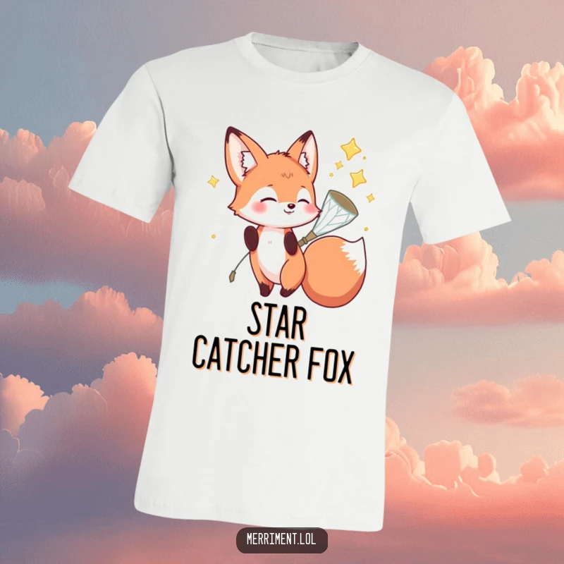 Funny fox t-shirt with a playful fox character catching falling stars in a small, sparkly net, a whimsical and delightful design.