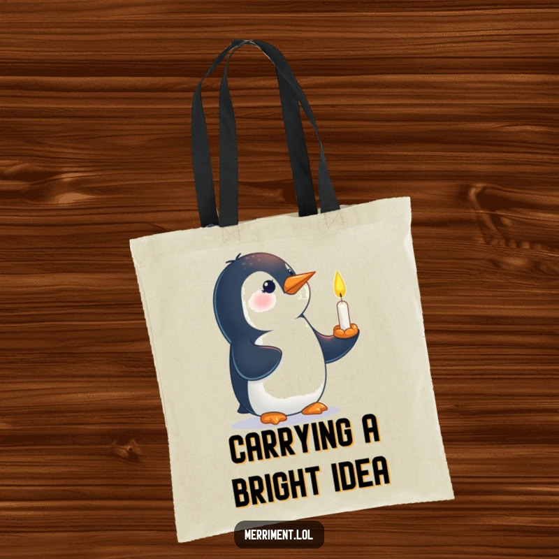 Funny tote bag showing a curious penguin balancing a small, lit candle on its beak with determination.